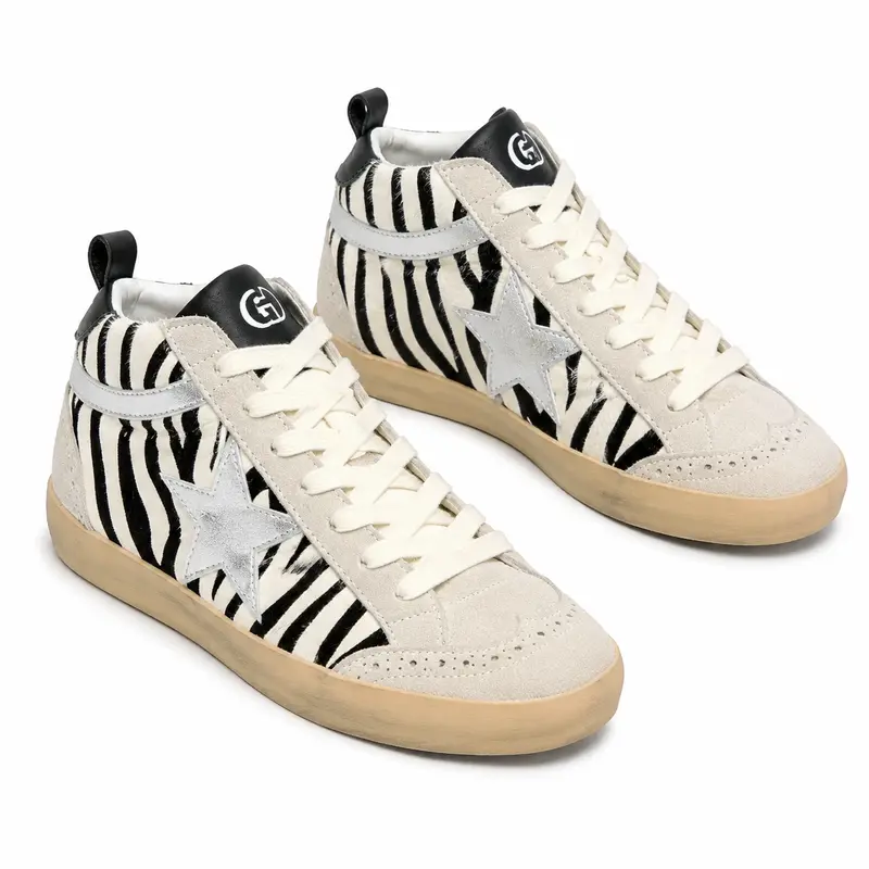 Golden Goose Mid Star footwear product reference on a clean background