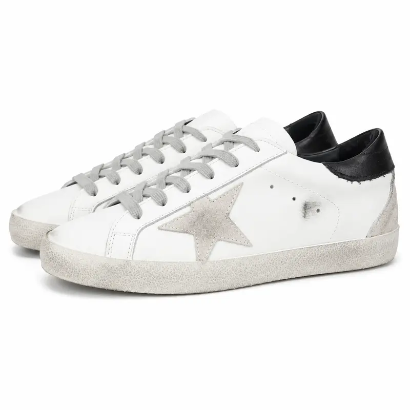Golden Goose Super-Star footwear product reference on a clean background