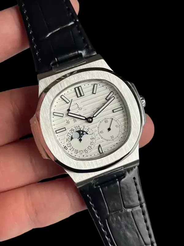 Patek Philippe Nautilus — White Dial / Black Strap product reference image