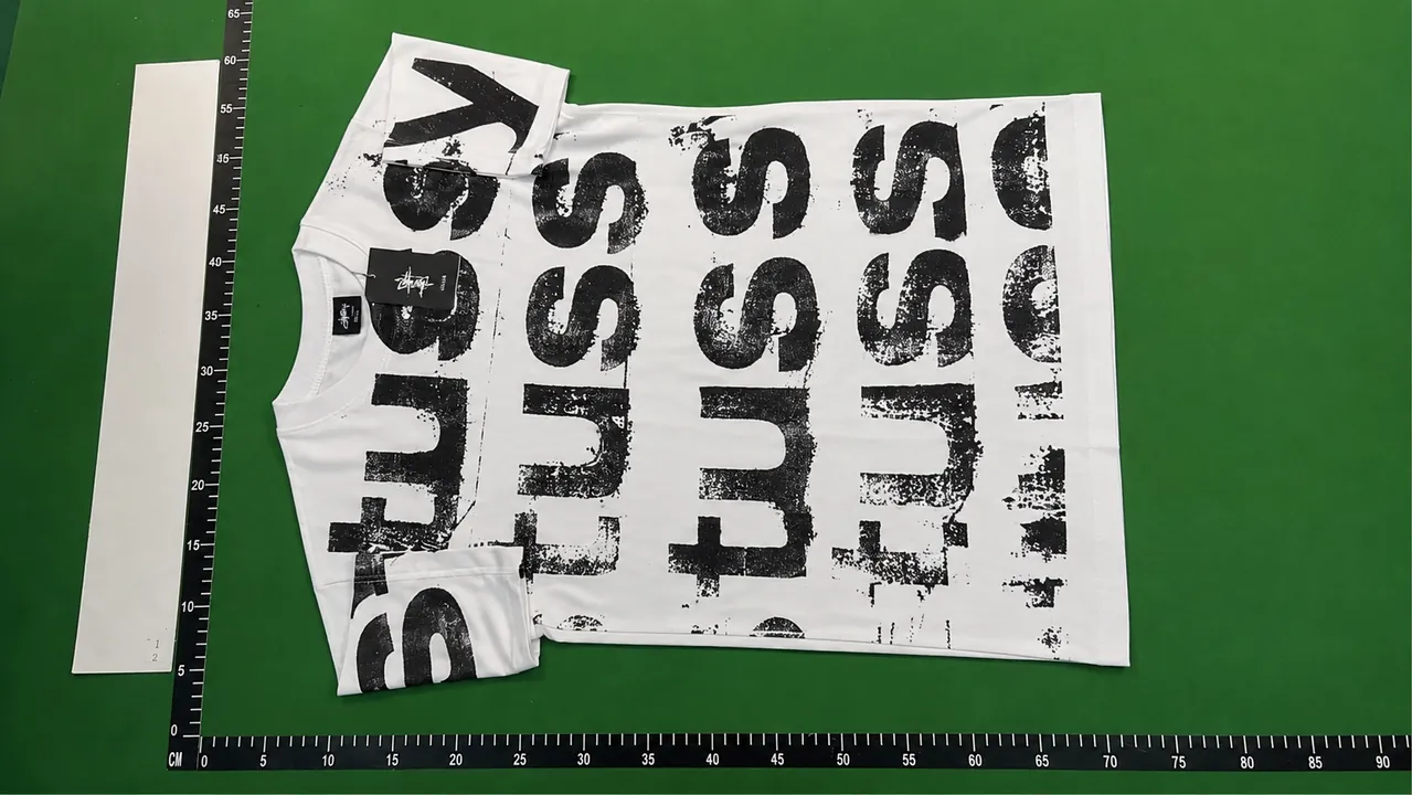 QC photo reference for Stamp Tee