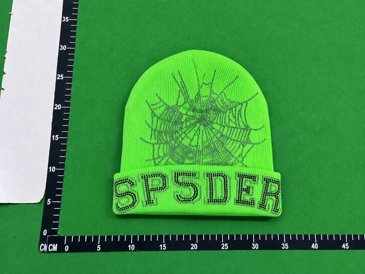 QC photo reference for Sp5der Neon Green Web Beanie