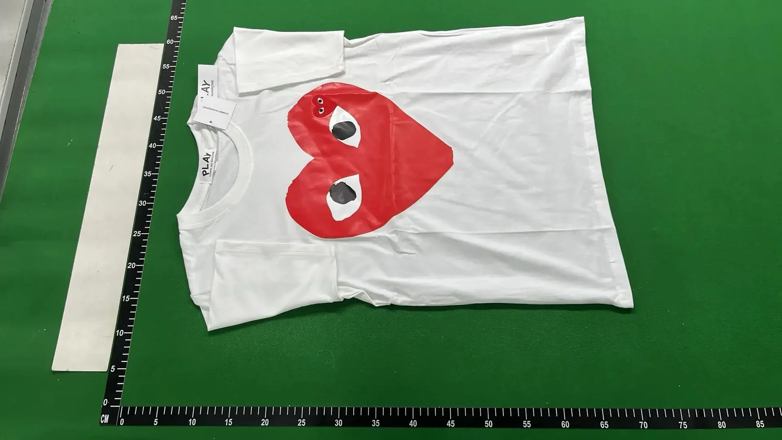 QC photo 1 for Comme Des Garçons Play Tee
